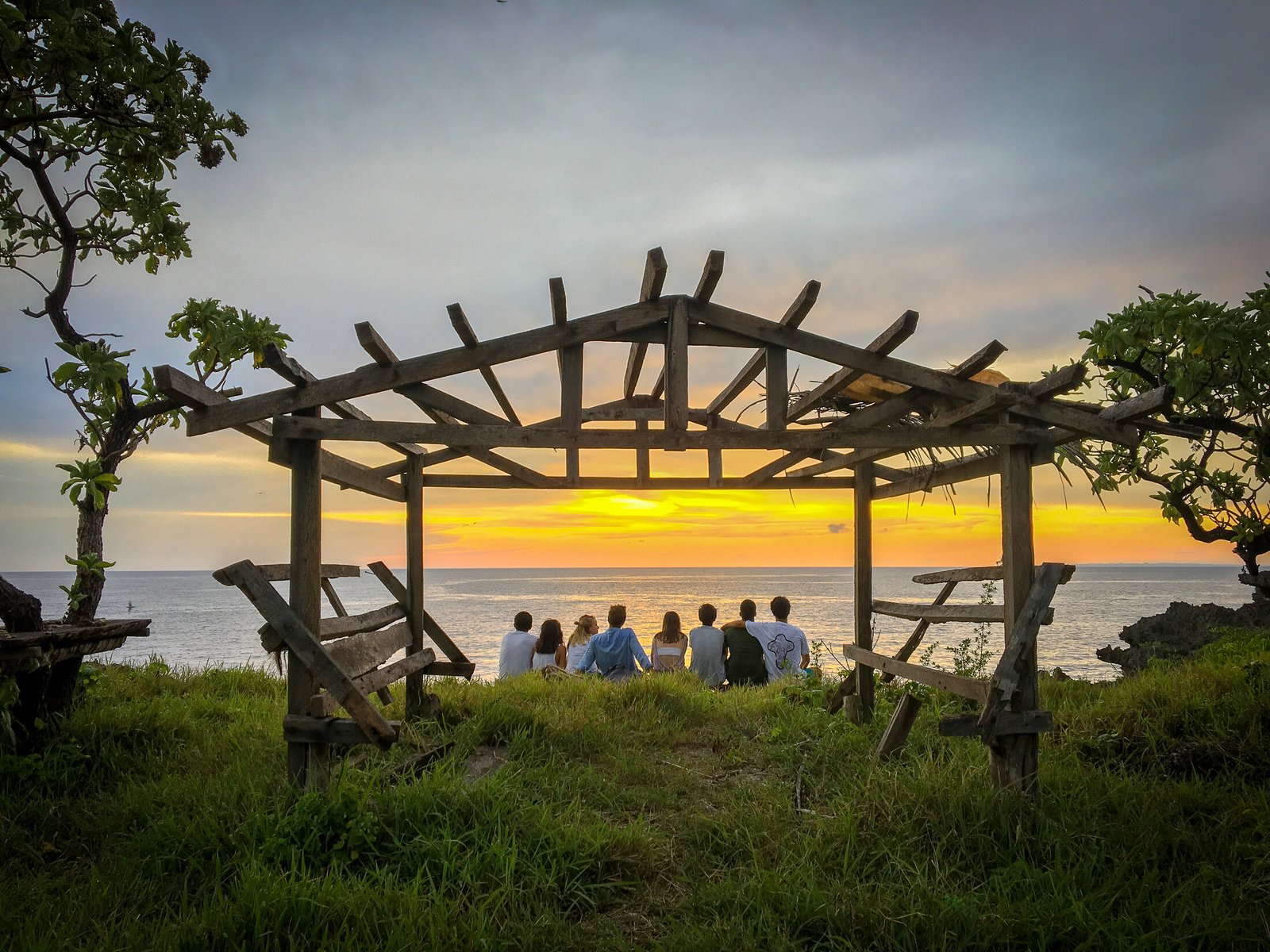 Sunset through a coastal arch